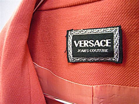 how to tell if versace clothes are real|Versace clothing label.